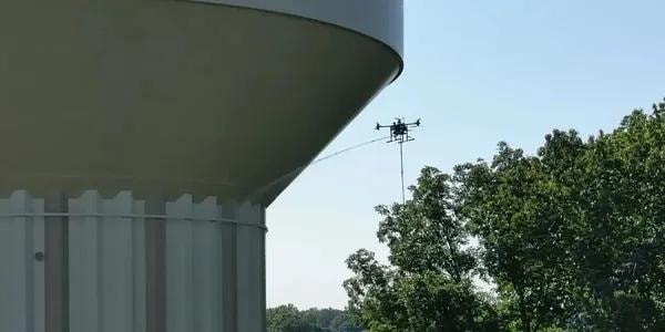 Drone cleaning building exterior